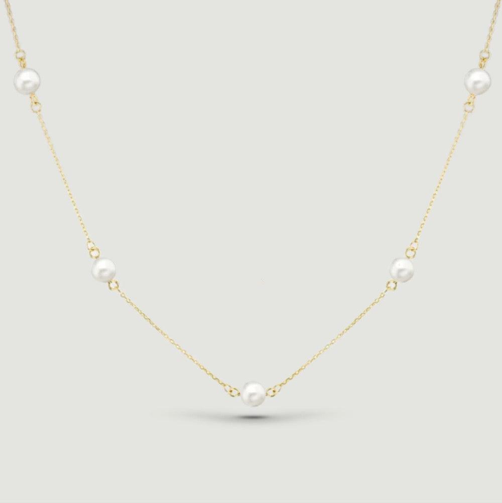 fine chain with five round pearls spaced evenly around