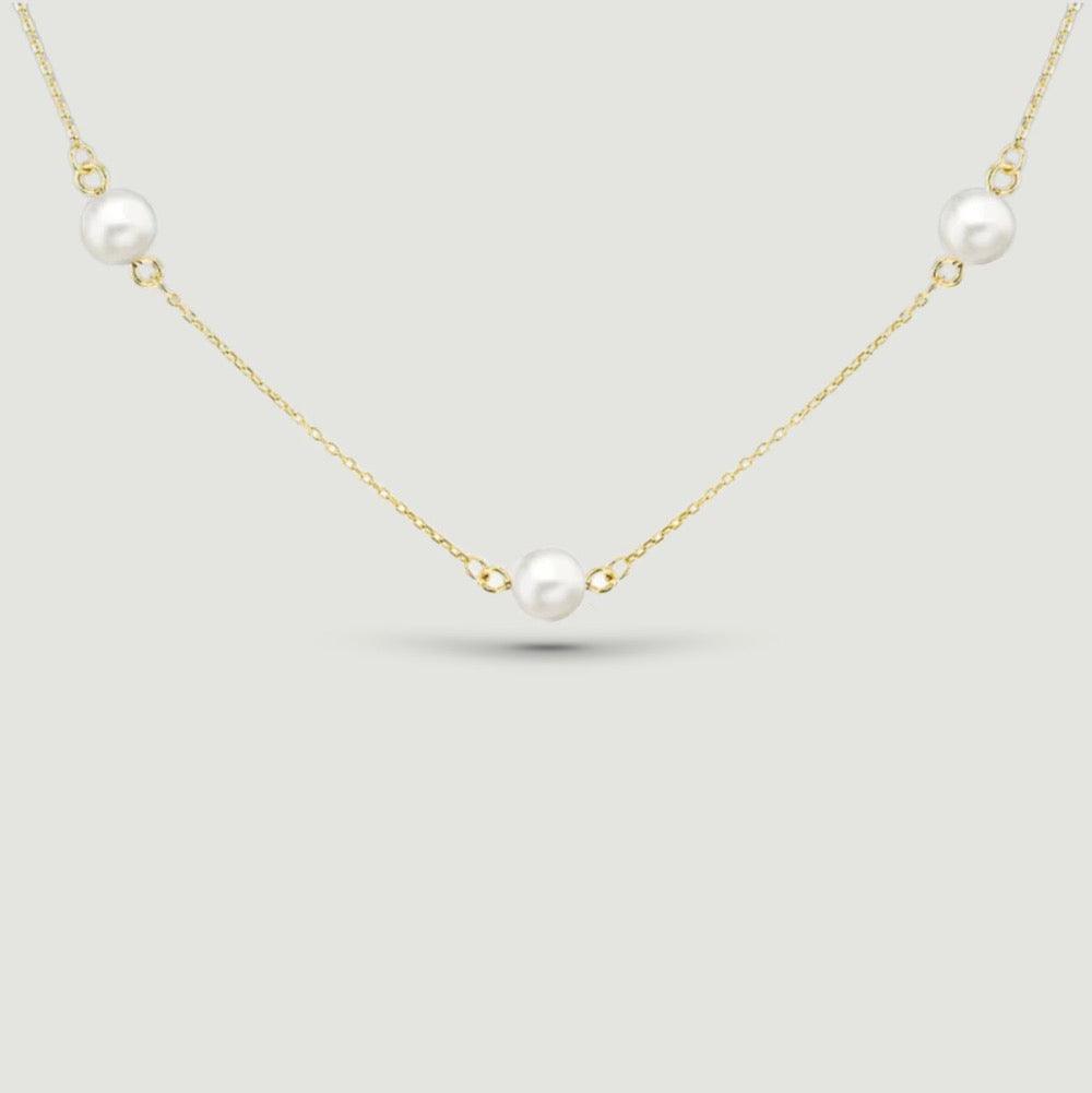 fine chain with five round pearls spaced evenly around