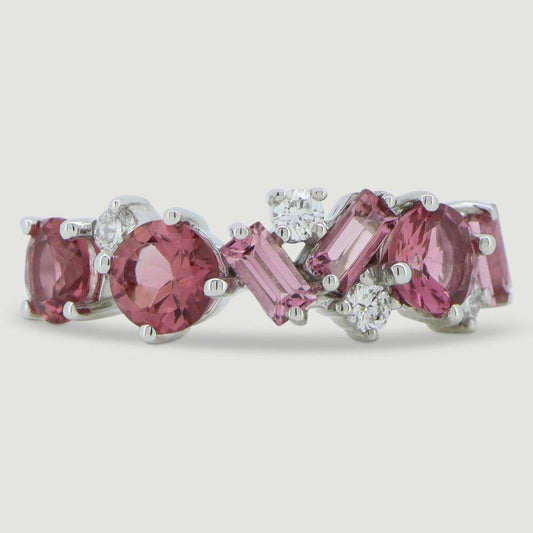 Pink tourmaline and diamond dress ring, stones scattered in a seemingly random patter - view from the top
