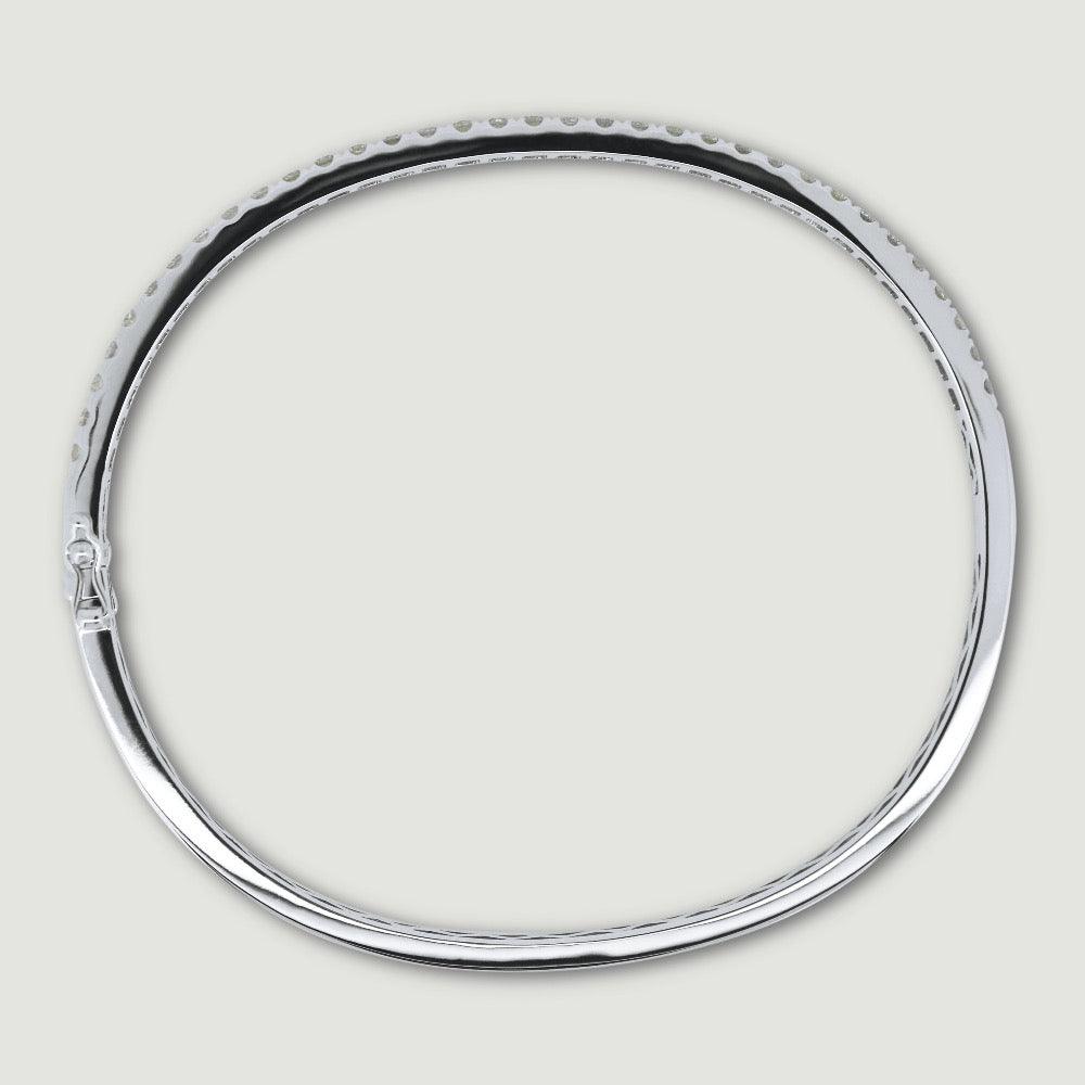 Bangle micro pavé set on the top half with round diamonds 18ct white gold - view from the side
