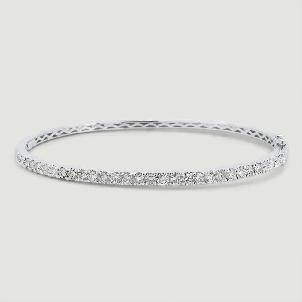 Bangle micro pavé set on the top half with round diamonds 18ct white gold - view from the top