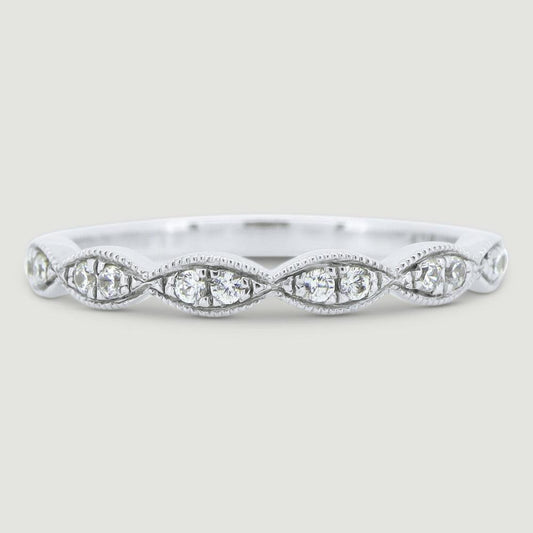 Fancy diamond ring set with 2 stones grain set into each marquise shaped section 18WG