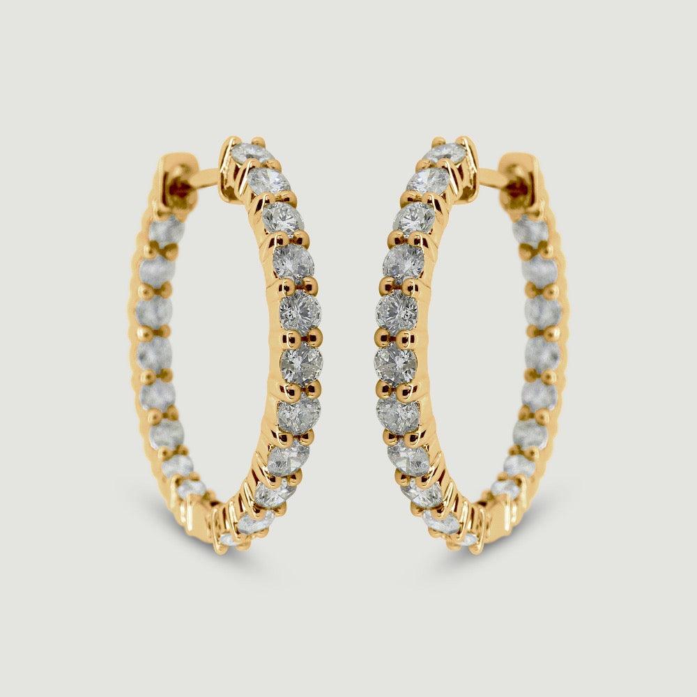 18ct yellow gold diamond hoop earrings claw set with round brilliant diamonds - view from the front