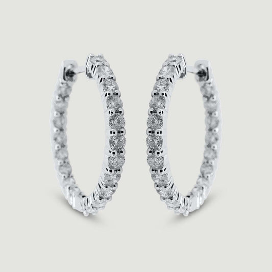 White gold claw set diamond hoop earrings - view from the front