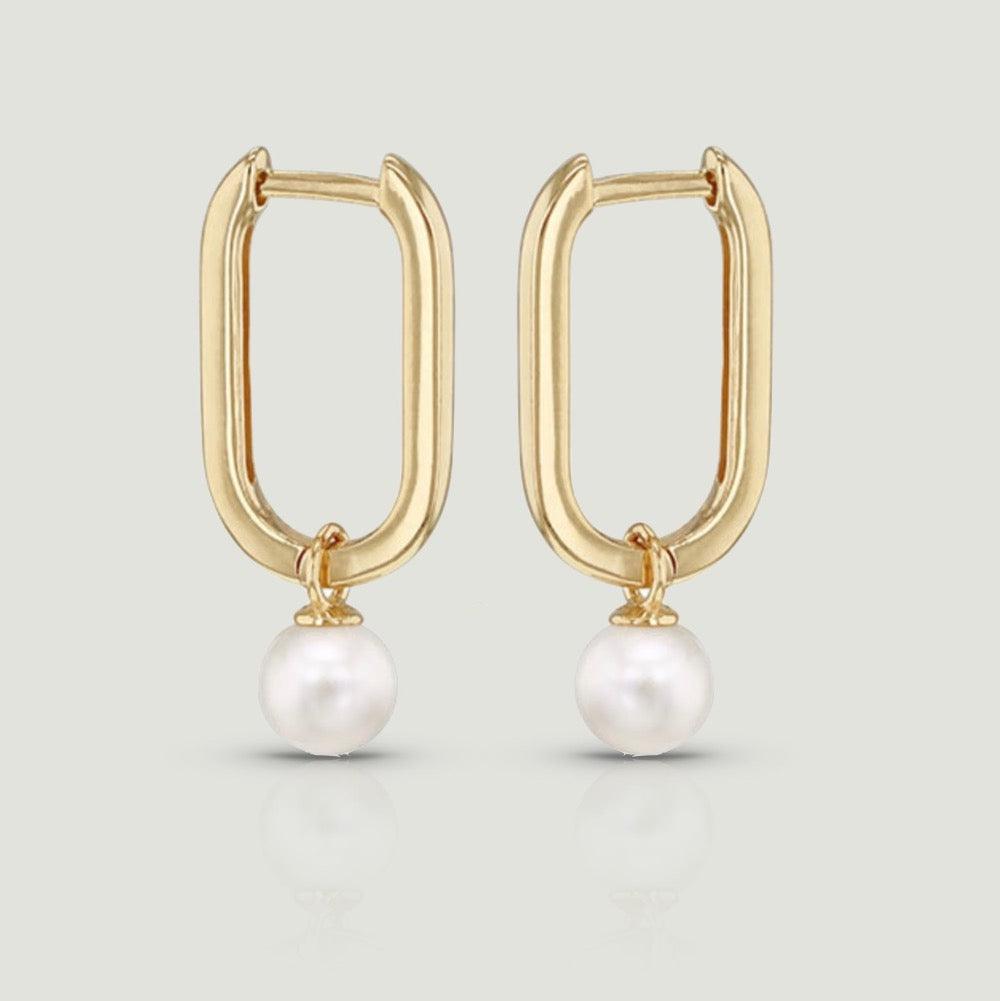 Oblong hoop with round pearl suspended at the bottom
