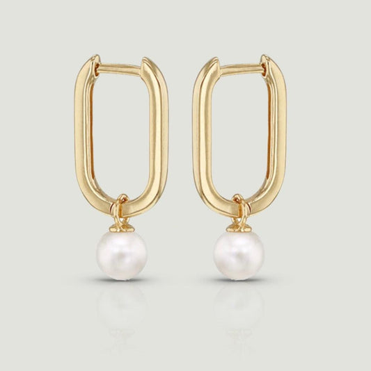 Oblong hoop with round pearl suspended at the bottom