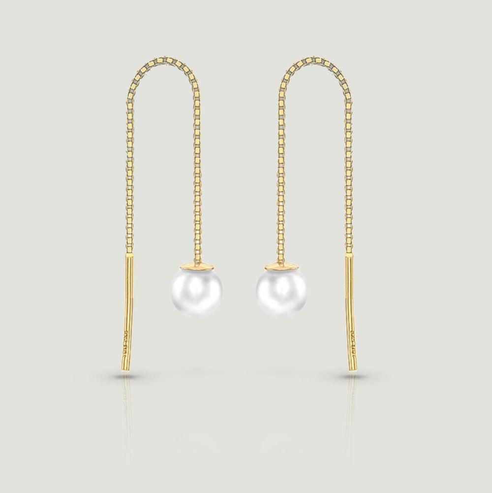 fine chain that pulls through the earlobe with a pearl dangling from the end