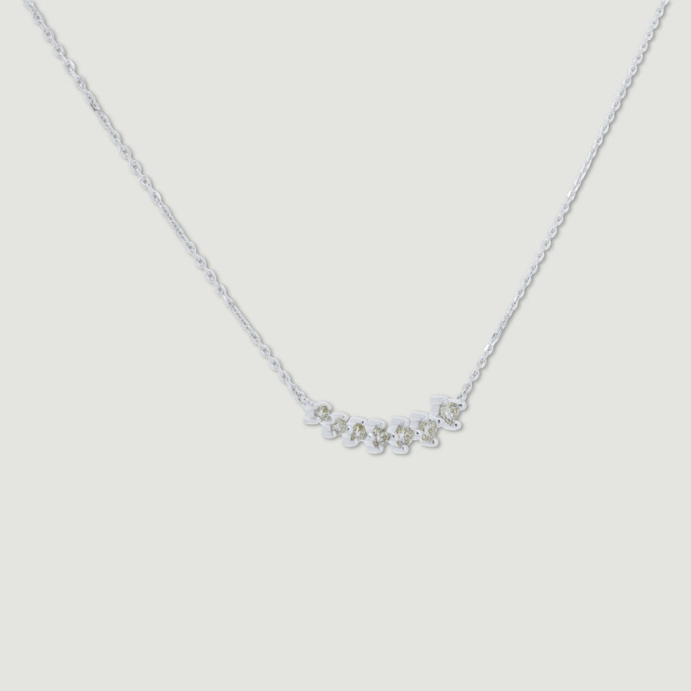 White gold diamond seven stone curved collar - view from angle