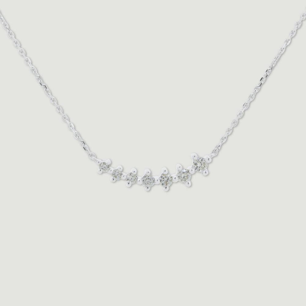 White gold diamond seven stone curved collar - view from front