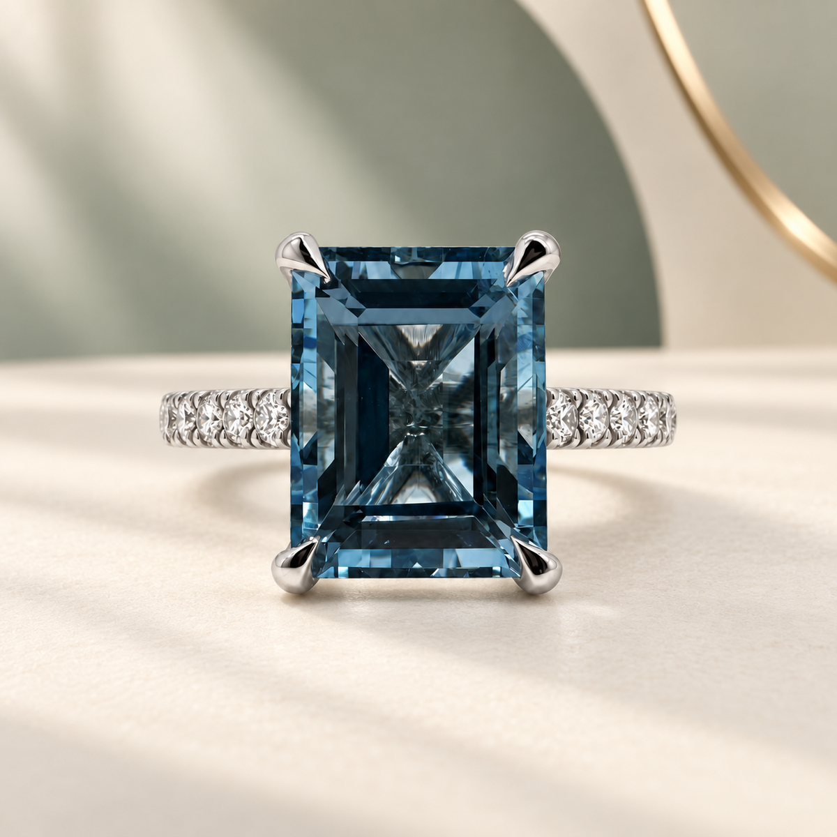 Emerald-cut Santa Maria aquamarine dress ring with diamond shoulders and a hidden halo.