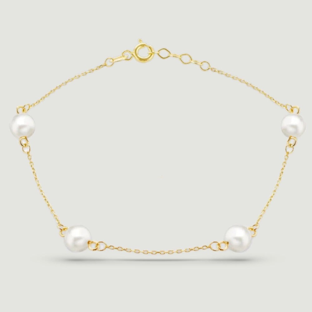 9ct yellow gold fine bracelet with four 6mm pearls every spaced