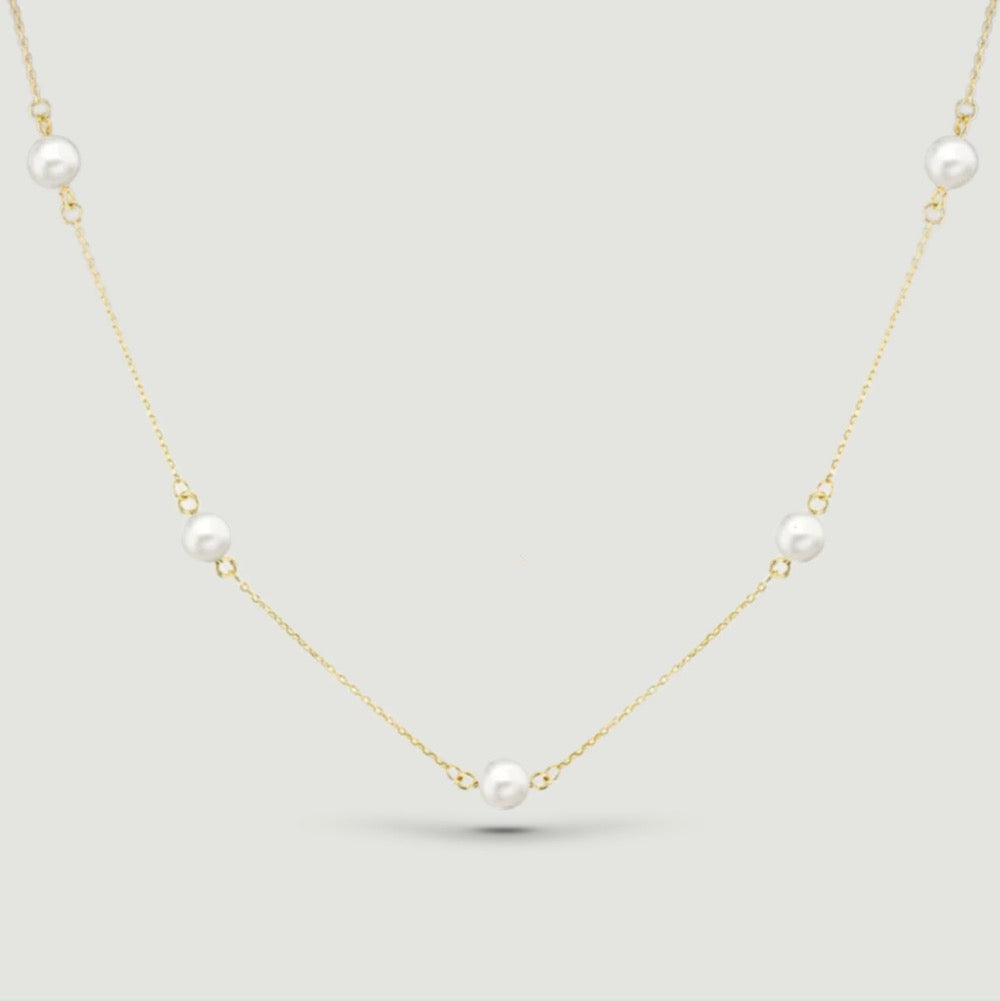 fine chain with five round pearls spaced evenly around
