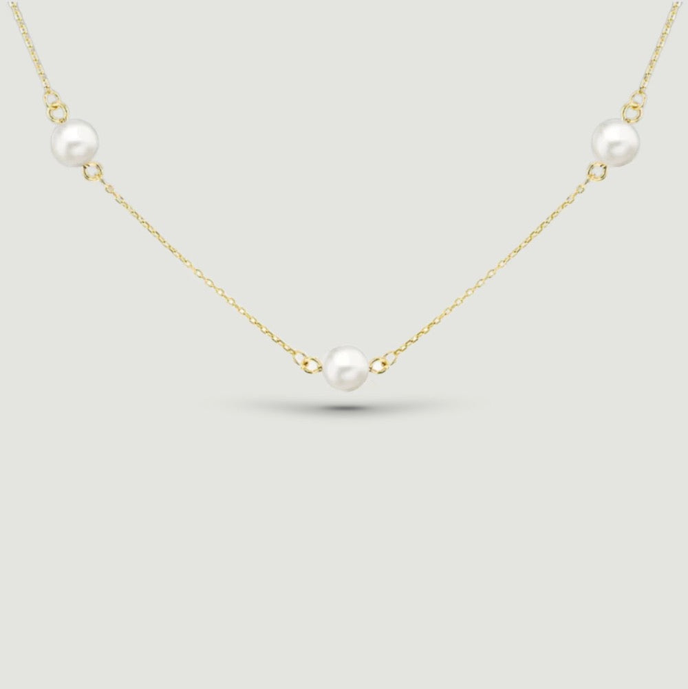 fine chain with five round pearls spaced evenly around