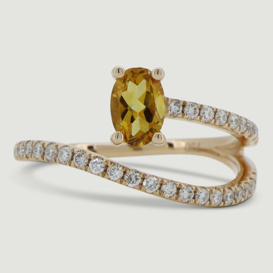 Rose gold two row swirl ring set with an oval citrine and micro-pavé set band - view from the top