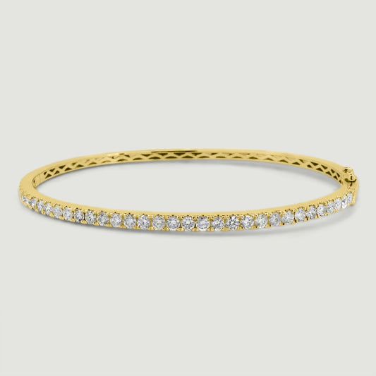 Bangle micro pavé set on the top half with round diamonds 18ct yellow gold - view from the top