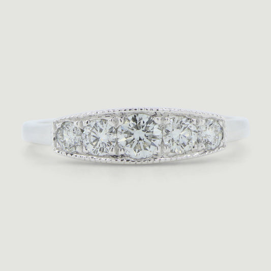 Five stone vintage style ring the round diamonds are grain set in a box with a mill grained edge the band of the ring is a little wide and plain - view from the front