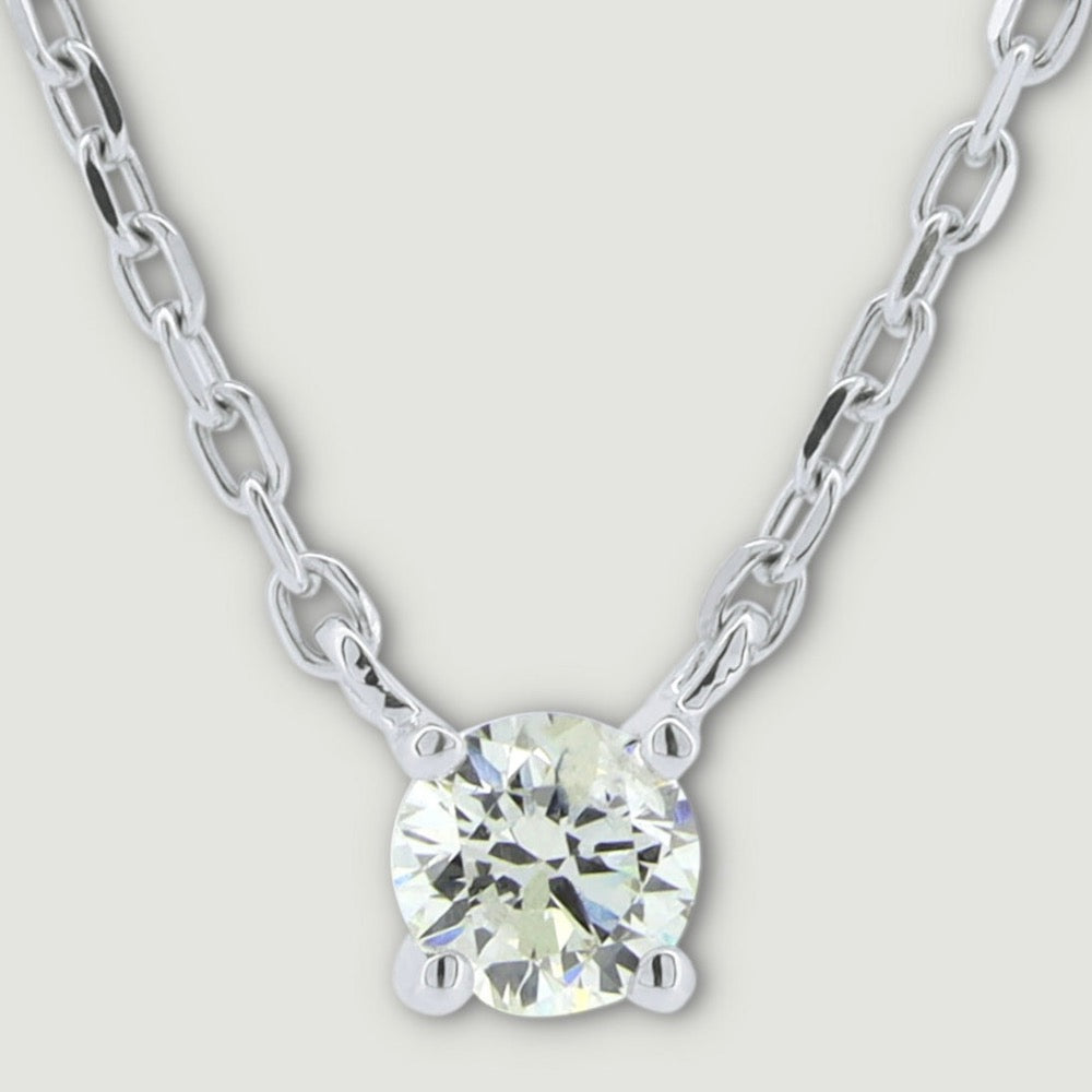 Four claw white gold diamond pendant round stone on a split chain