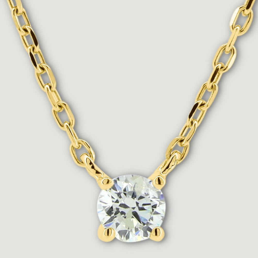 Four claw yellow gold diamond pendant round stone on a split chain