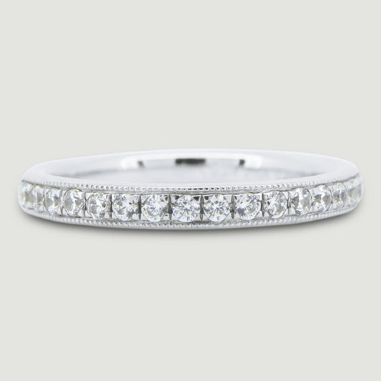 Court shaped 2.5mm band gain set with round brilliant diamonds with a beaded edge 18WG