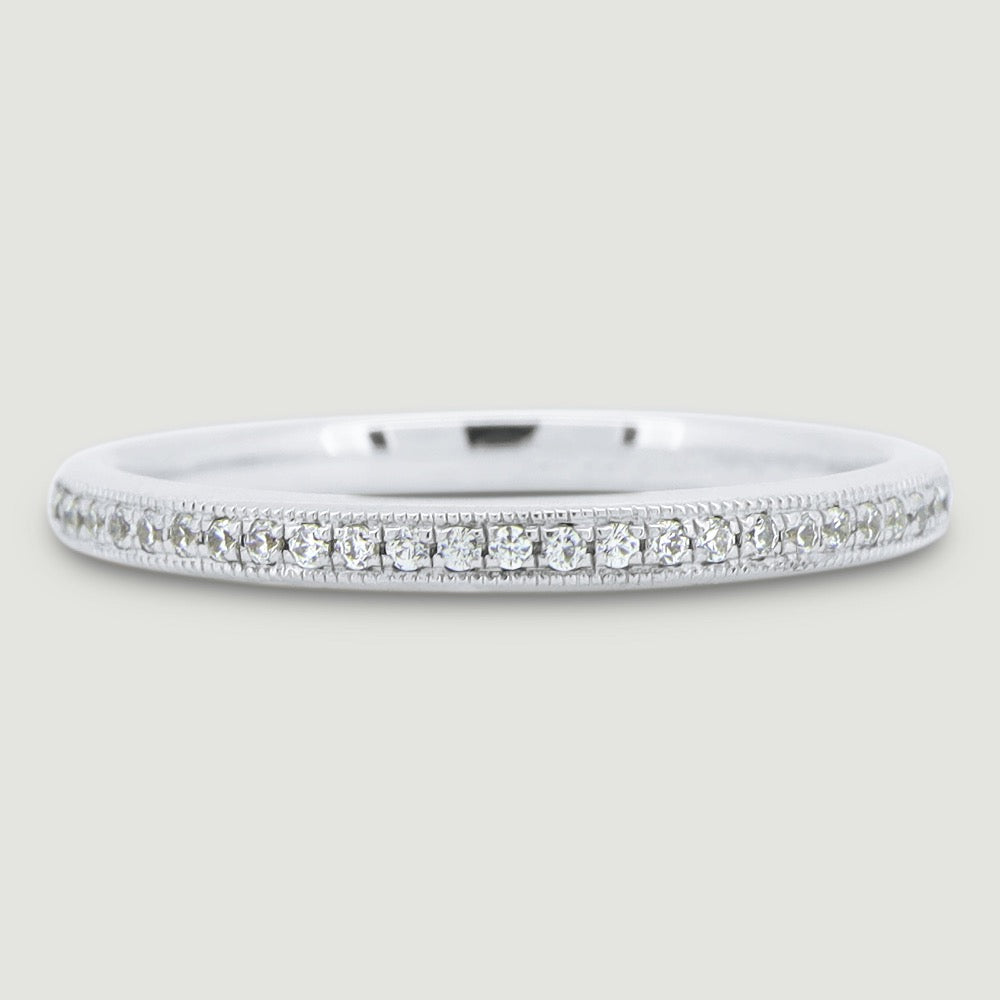 Court shaped band gain set with round brilliant diamonds with a beaded edge 18WG 2mm