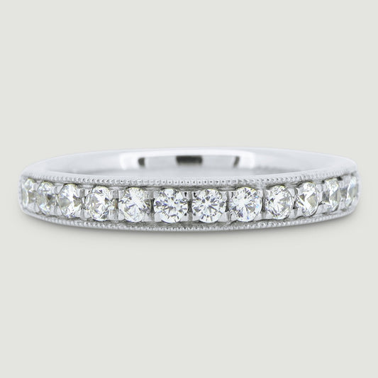3mm court shape ring grain set with round diamonds and a beaded edge 18WG