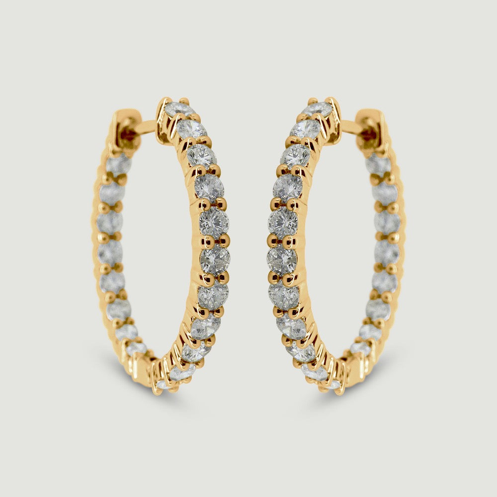 18ct yellow gold diamond hoop earrings claw set with round brilliant diamonds - view from the front
