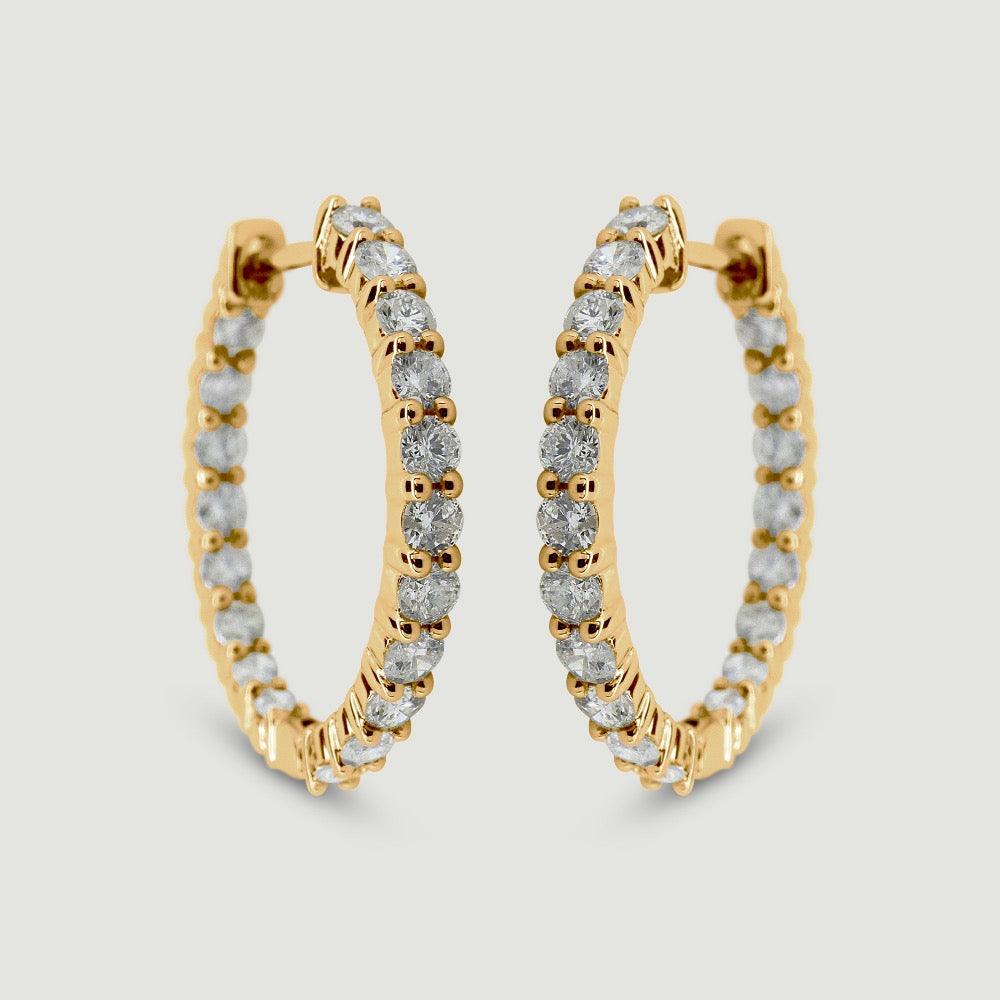 18ct yellow gold diamond hoop earrings claw set with round brilliant diamonds - view from the front