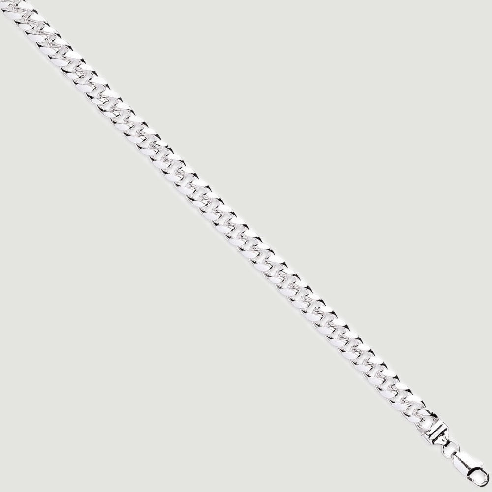 Silver chain, the links are formed in domed curb style 8.4mm wide.
