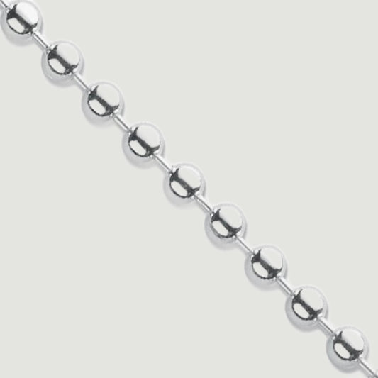 Silver bracelet, made from a ball-link chain each ball measuring 4mm in diameter - close up