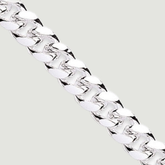 Silver chain, the links are formed in domed curb style 8.4mm wide - close up