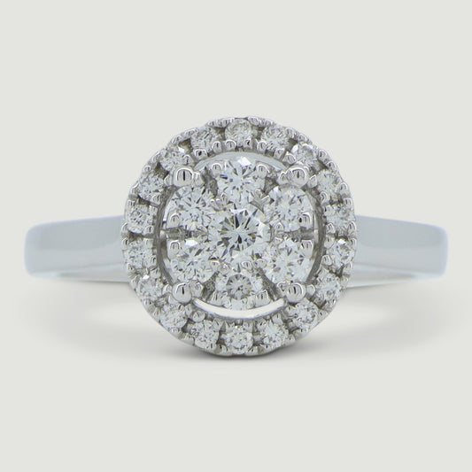 18ct white gold halo style ring the micro-pavé set halo encompasses a cluster of seven round diamonds - view from the top