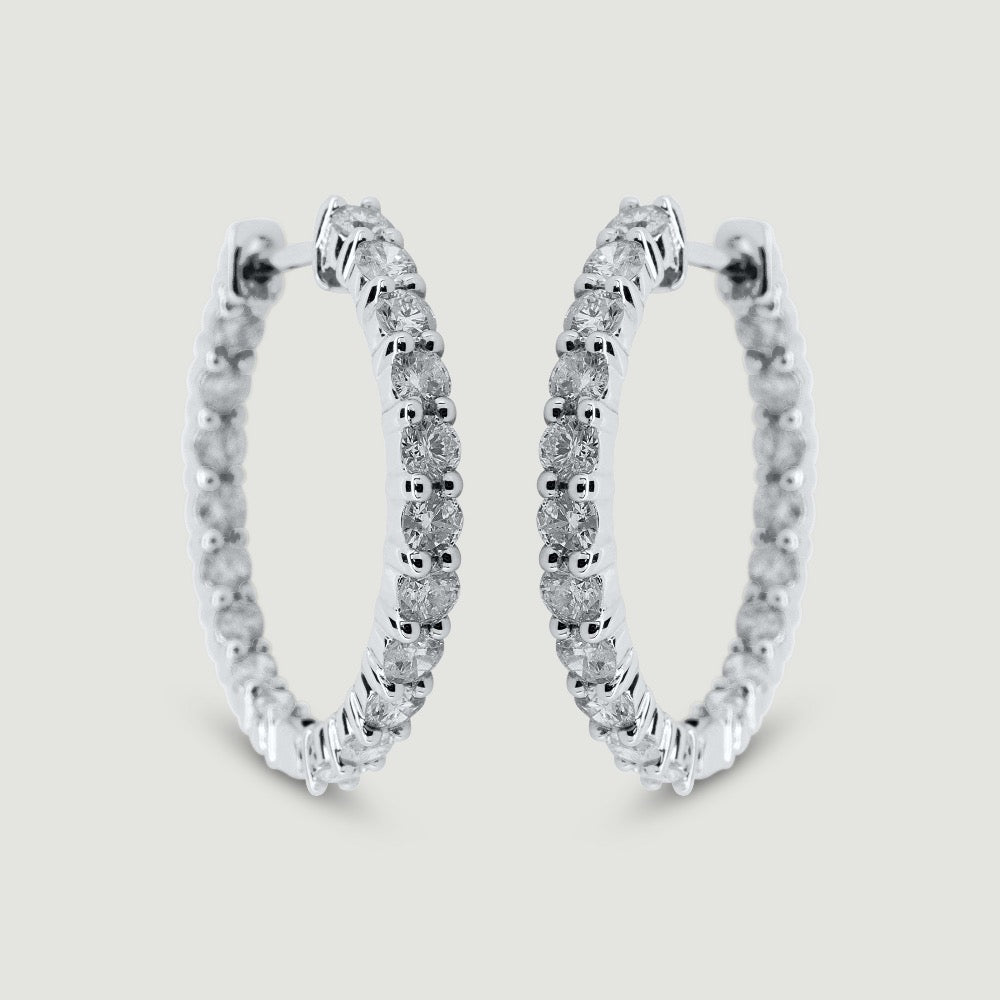White gold claw set diamond hoop earrings - view from the front