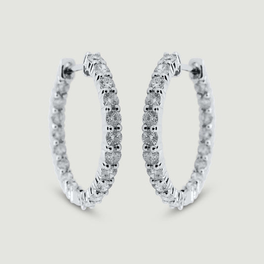 White gold claw set diamond hoop earrings - view from the front