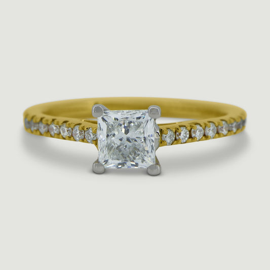 18ct yellow gold solitaire ring set with a princess cut centre stone and round diamonds micro-pavé set in the shoulders - view from the top