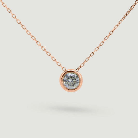 Rose gold Rub over round diamond pendant sliding on a chain - view from the front