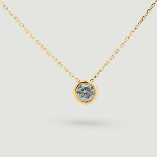 Yellow gold Rub over round diamond pendant sliding on a chain - view from the front