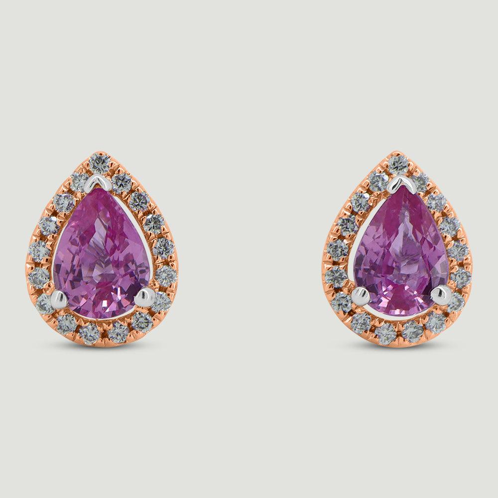 18ct rose gold pear shaped stud earrings, each set with a pink sapphire centre stone surrounded by a micro-pavé set halo of round diamonds