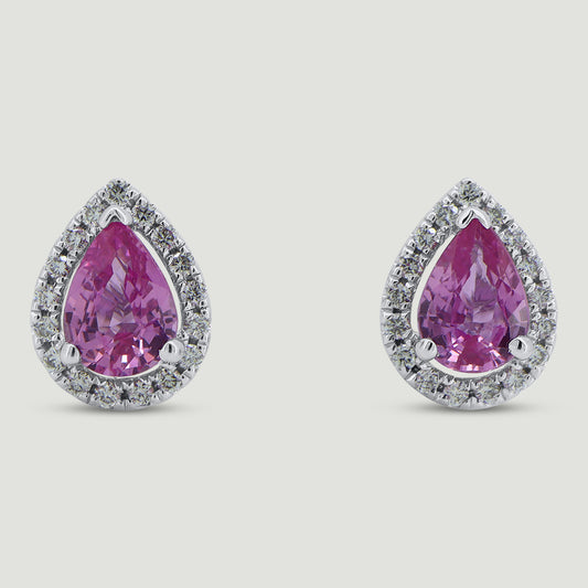 18ct white gold pear shaped stud earrings, each set with a pink sapphire centre stone surrounded by a micro-pavé set halo of round diamonds