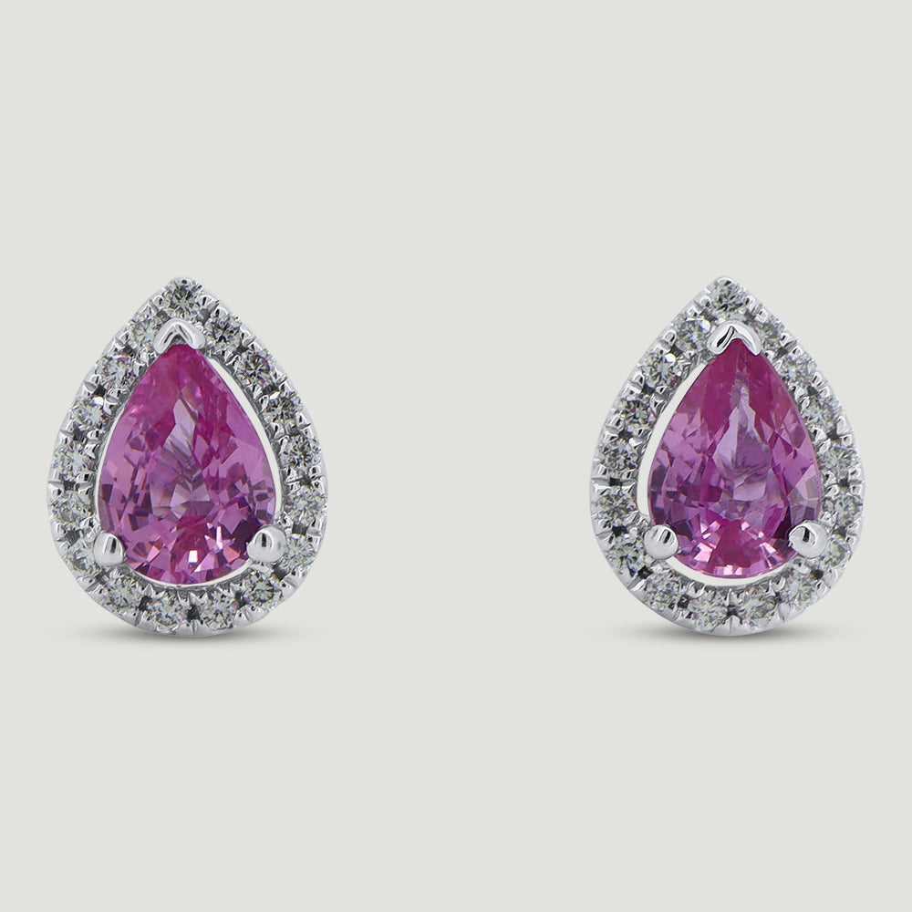 18ct white gold pear shaped stud earrings, each set with a pink sapphire centre stone surrounded by a micro-pavé set halo of round diamonds